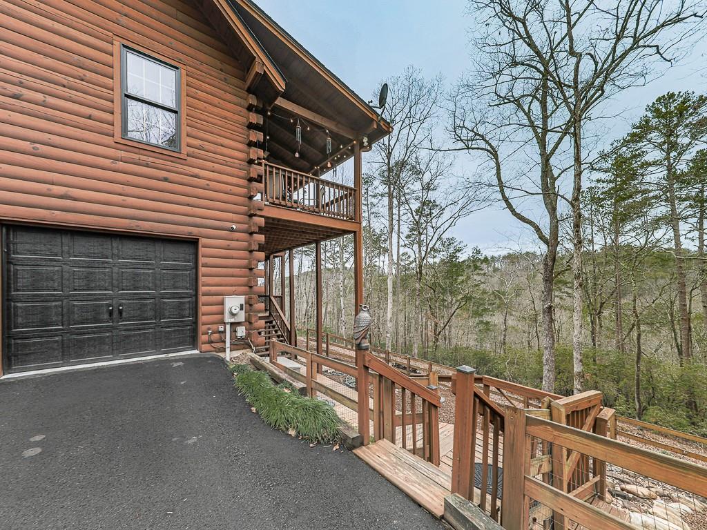 1670 Outback Road Jasper, GA 30143 - Photo 54 of 75 a front view of a house with a yard