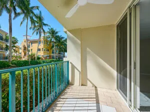 a view of a balcony with a potted plants