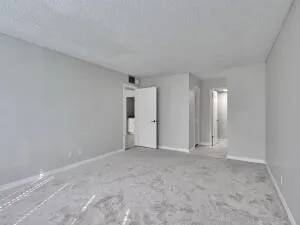 a view of an empty room and window