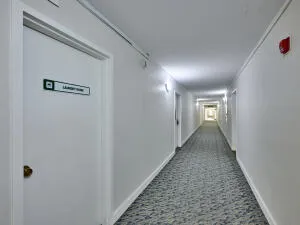 a view of storage and utility room with a washer dryer
