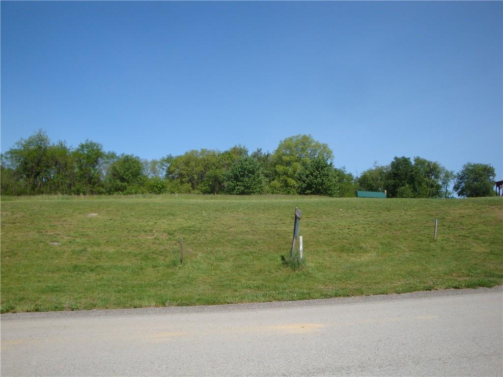 715 Victoria Way Derry, PA 15627 - Photo 1 of 5 a view of a lake from a yard