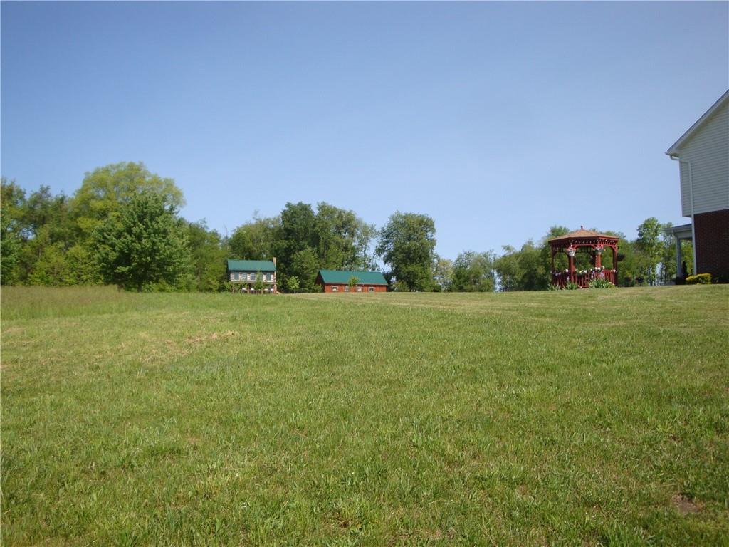 715 Victoria Way Derry, PA 15627 - Photo 2 of 5 a view of green field with trees in the background