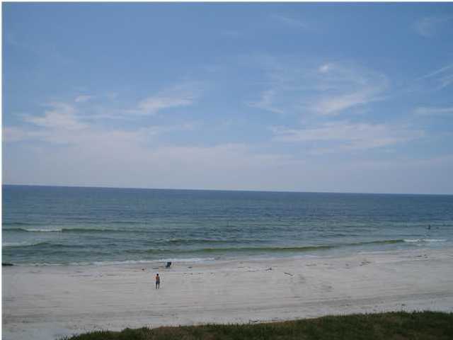 556 Blue Mountain Beach Road Santa Rosa Beach, FL 32459 - Photo 3 of 14 a view of an ocean beach