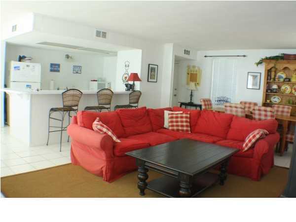 556 Blue Mountain Beach Road Santa Rosa Beach, FL 32459 - Photo 10 of 14 a living room with furniture and wooden floor