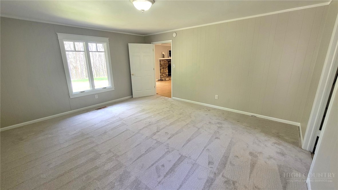 172 Yarrow Lane Boone, NC 28607 - Photo 15 of 30 an empty room with windows and closet