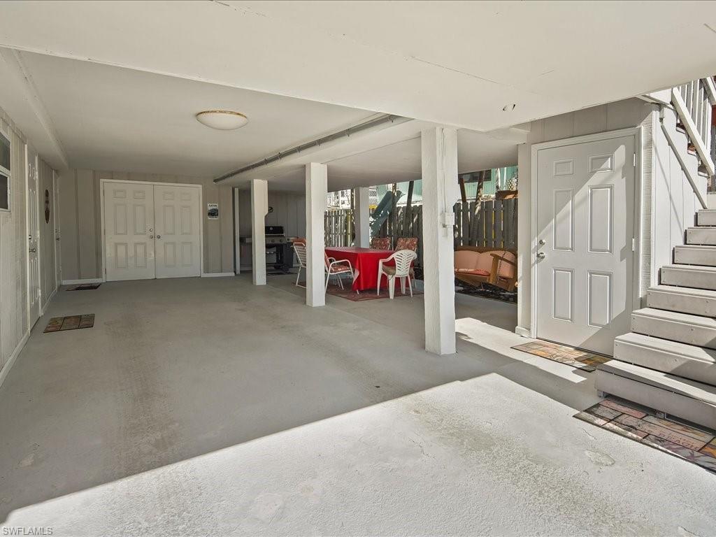 565 Coconut Avenue Goodland, FL 34140 - Photo 28 of 35 View of patio with a carport