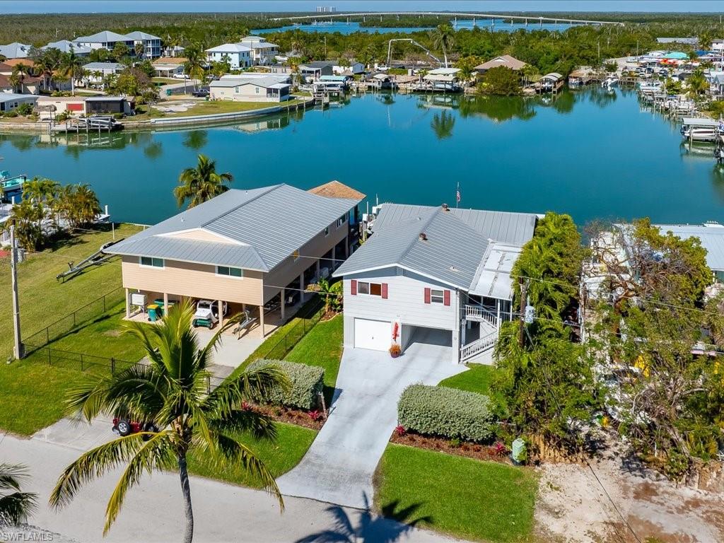 565 Coconut Avenue Goodland, FL 34140 - Photo 30 of 35 Drone / aerial view with a water view