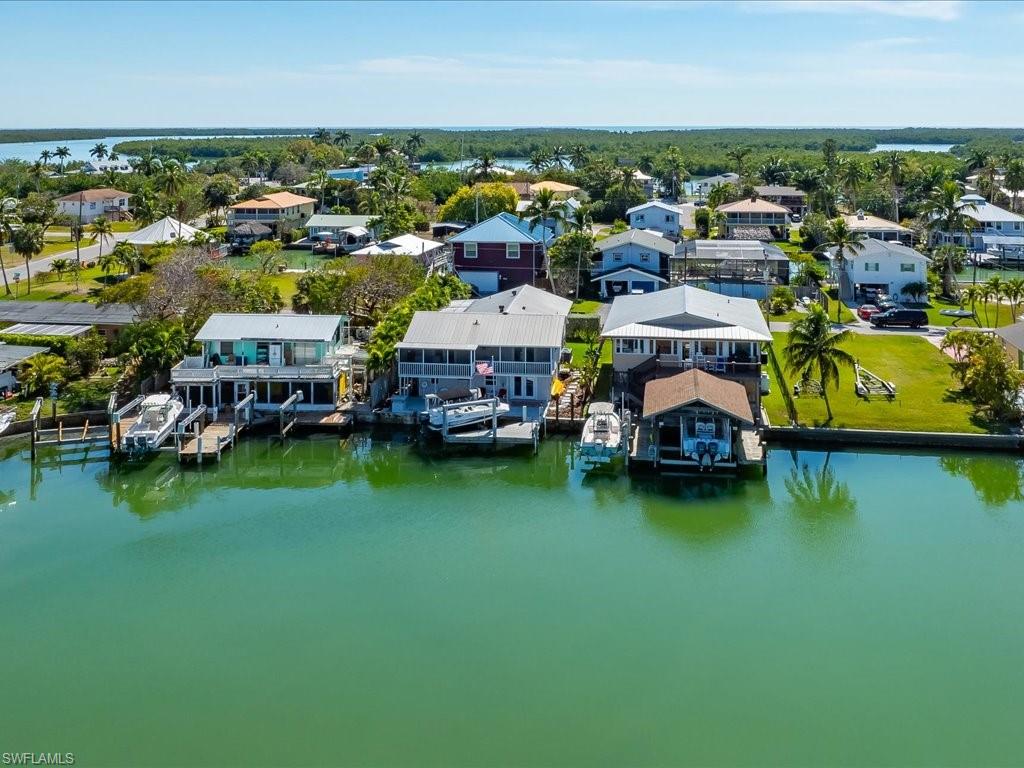 565 Coconut Avenue Goodland, FL 34140 - Photo 34 of 35 Bird's eye view featuring a water view
