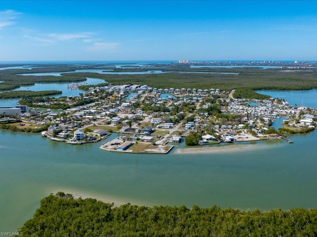 565 Coconut Avenue Goodland, FL 34140 - Photo 35 of 35 Birds eye view of property with a water view