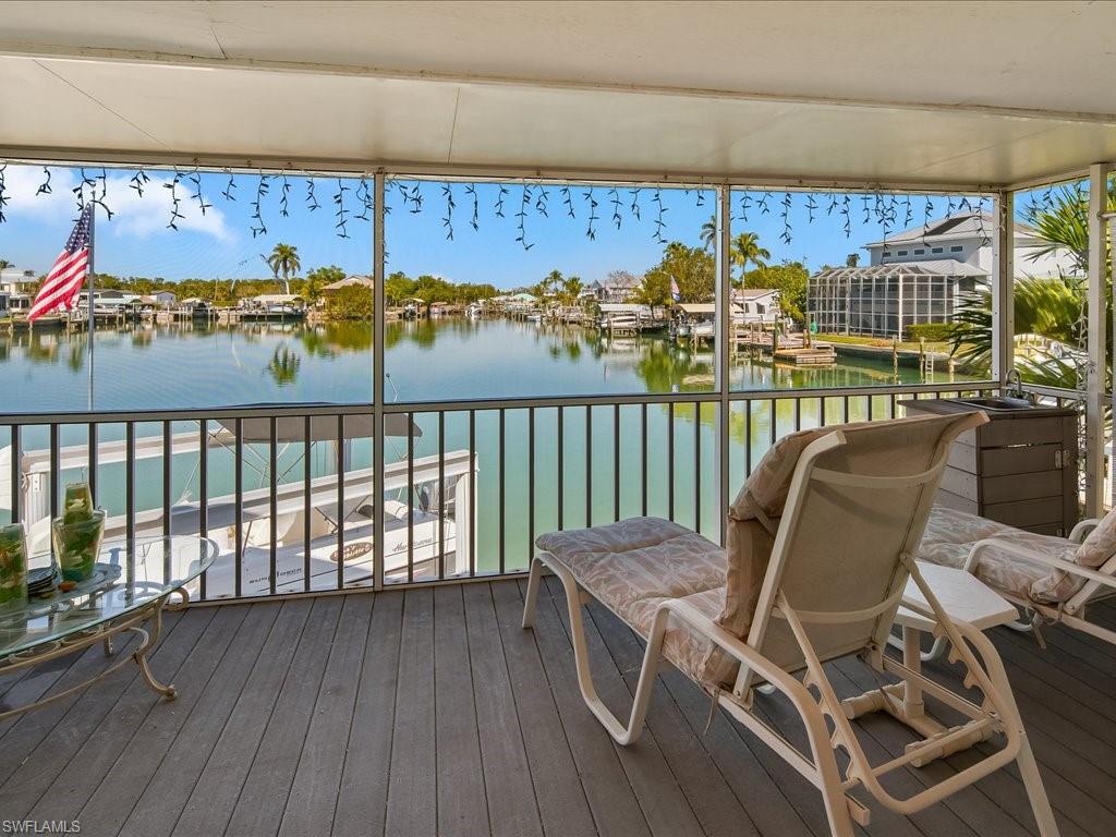 565 Coconut Avenue Goodland, FL 34140 - Photo 6 of 35 Wooden terrace with a water view