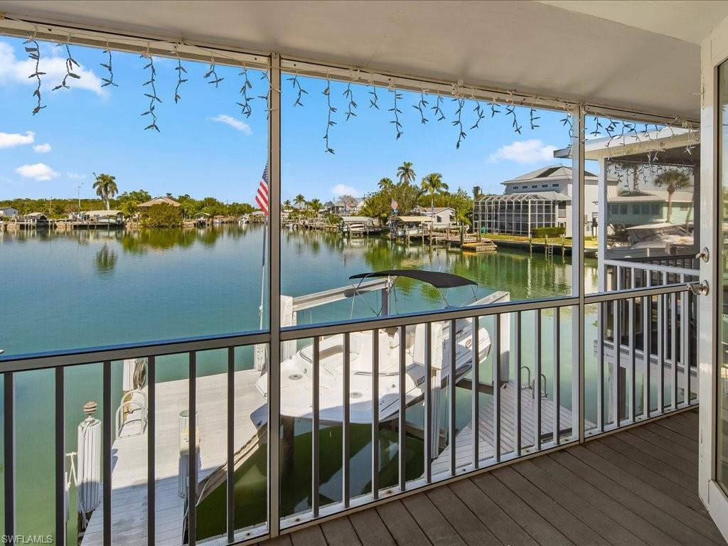 565 Coconut Avenue Goodland, FL 34140 - Photo 7 of 35 Wooden terrace with a water view