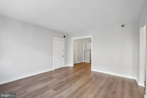 a view of an empty walk in closet