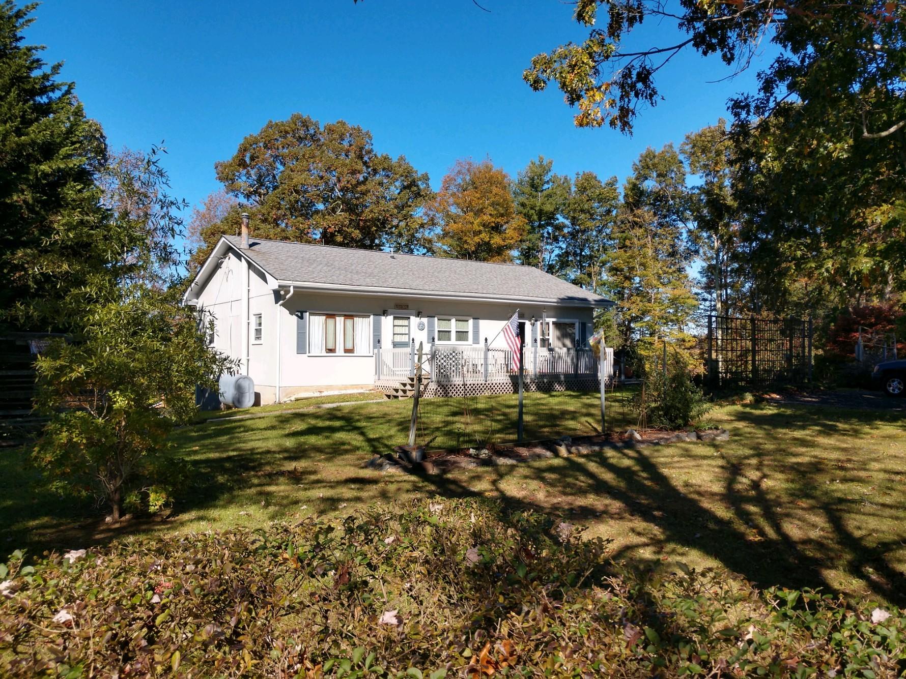 a view of a house with a big yard