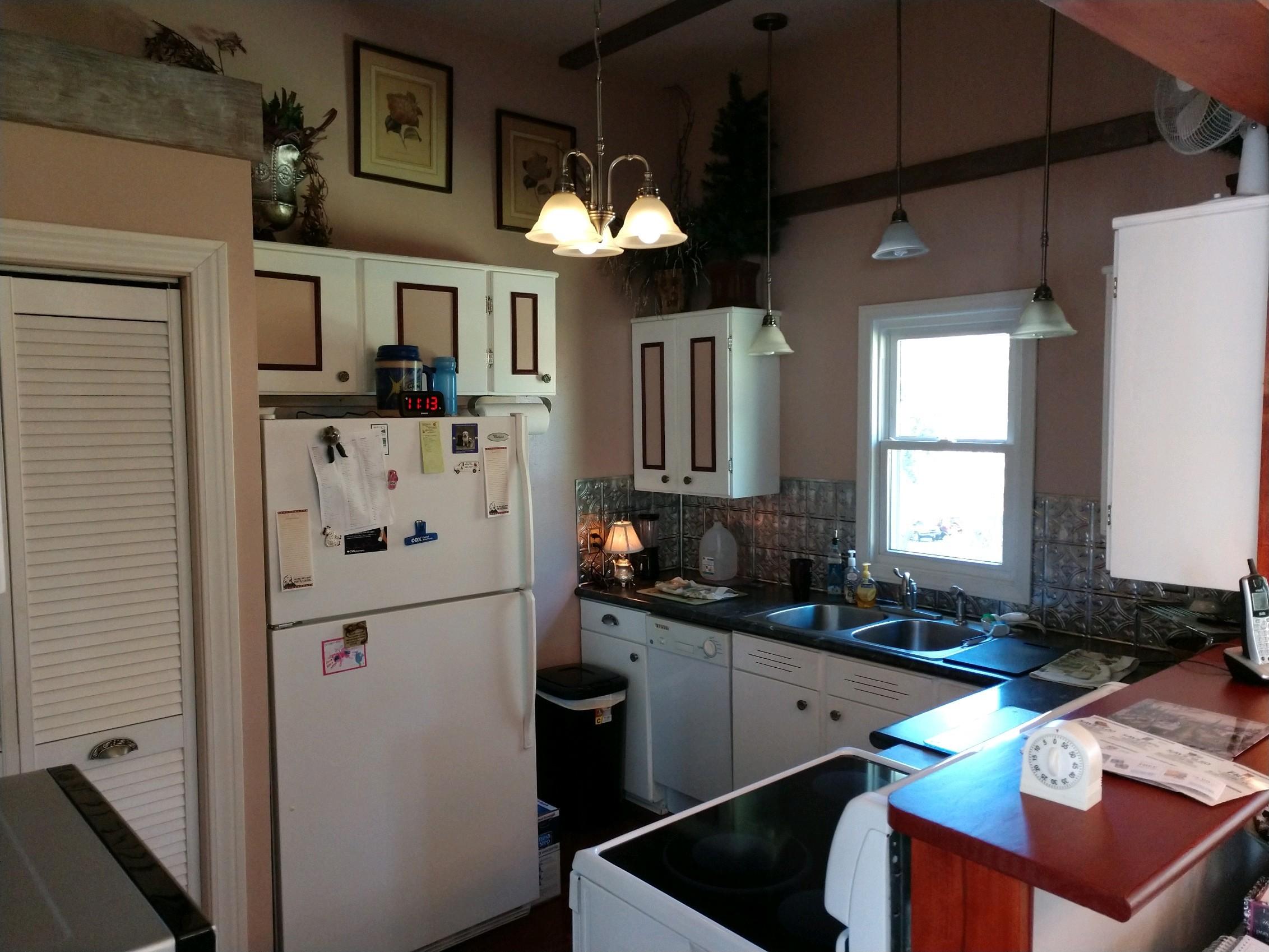 152 Oak View Lane Northeast Riner, VA 24149 - Photo 15 of 39 a kitchen with cabinets and stainless steel appliances