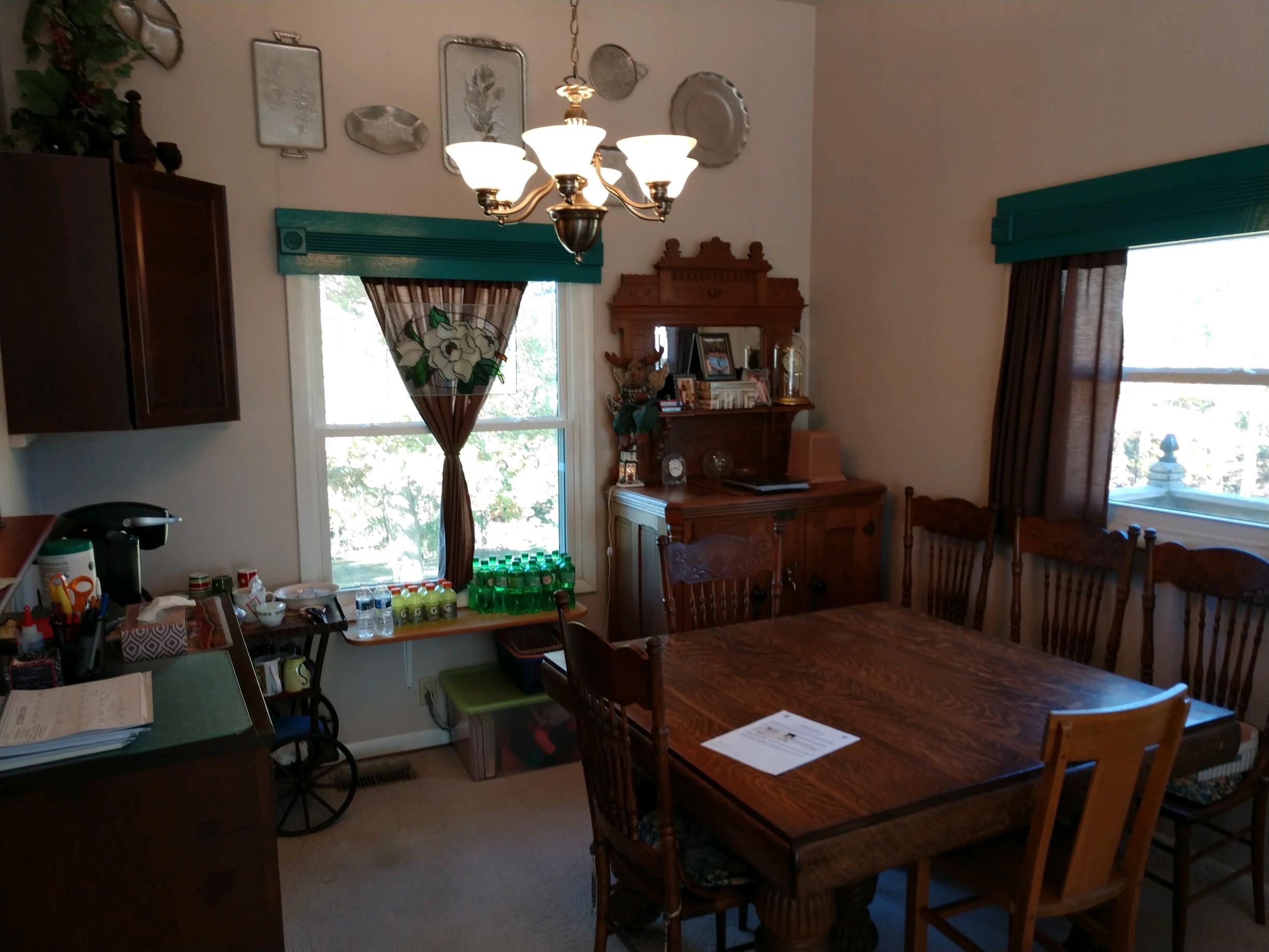 152 Oak View Lane Northeast Riner, VA 24149 - Photo 17 of 39 a view of a dining room with furniture window and outside view