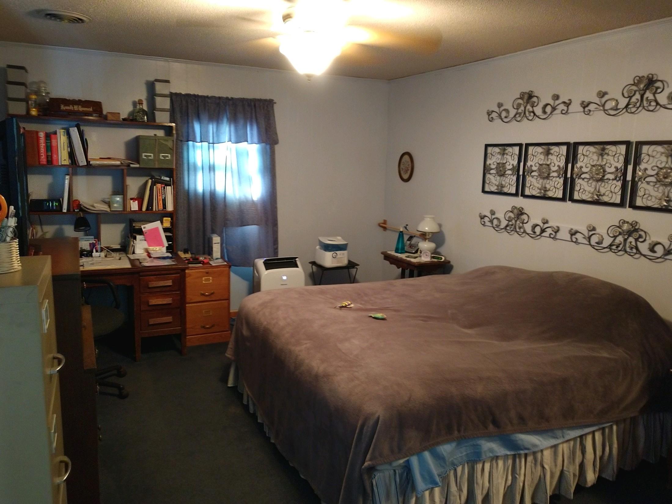 152 Oak View Lane Northeast Riner, VA 24149 - Photo 22 of 39 a bedroom with a bed and closet