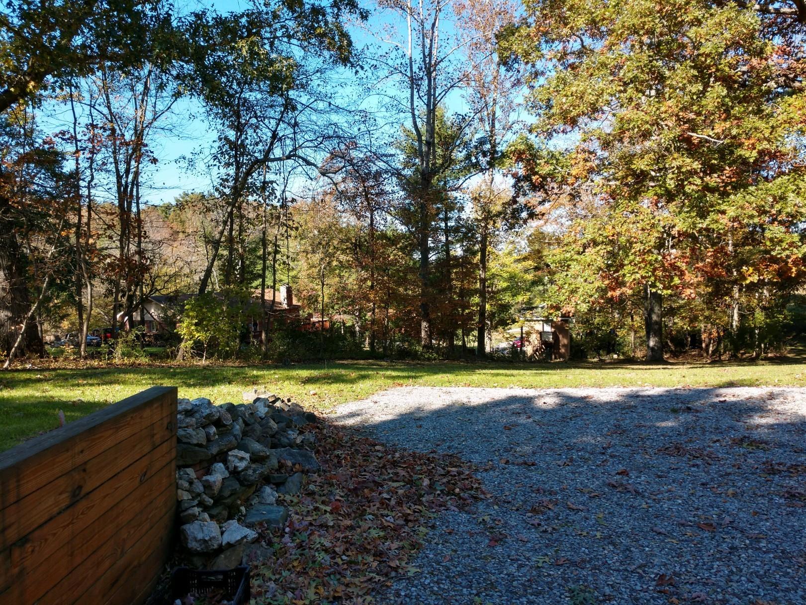 152 Oak View Lane Northeast Riner, VA 24149 - Photo 7 of 39 a view of a yard with lots of green space and trees