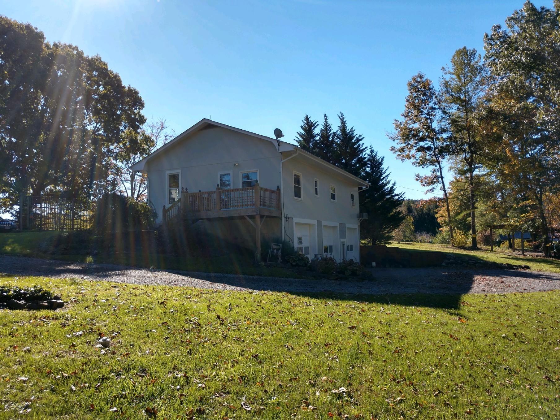 152 Oak View Lane Northeast Riner, VA 24149 - Photo 9 of 39 a front view of a house with a yard