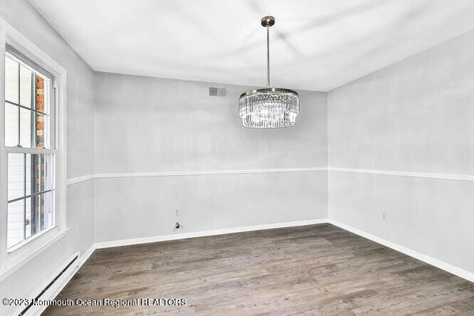 407 Cook Road Jackson, NJ 08527 - Photo 5 of 25 a view of a room with a ceiling fan and window
