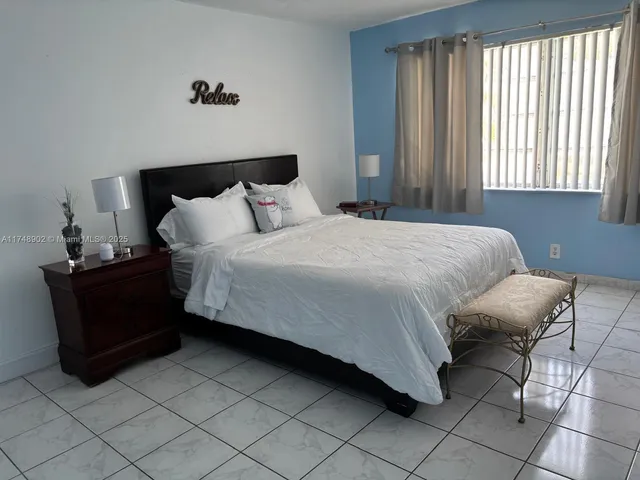 a view of a storage and utility room with a window