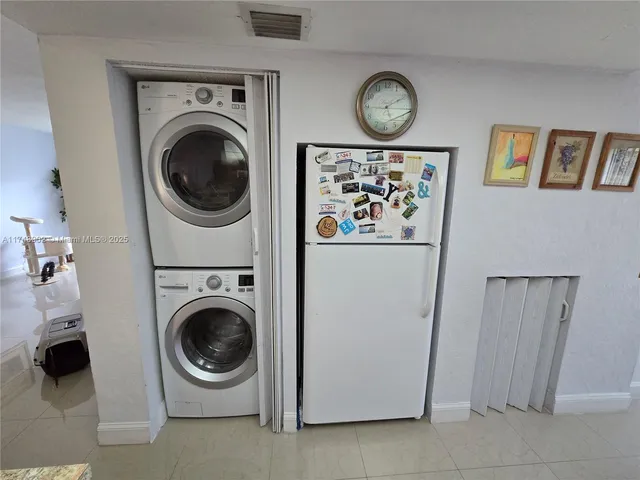 a view of a house with a back yard