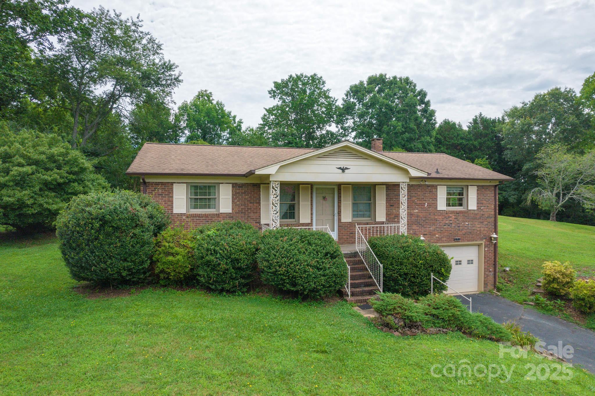 554 Wildlife Access Road Hickory, NC 28601 - Photo 1 of 34 a aerial view of a house with a yard