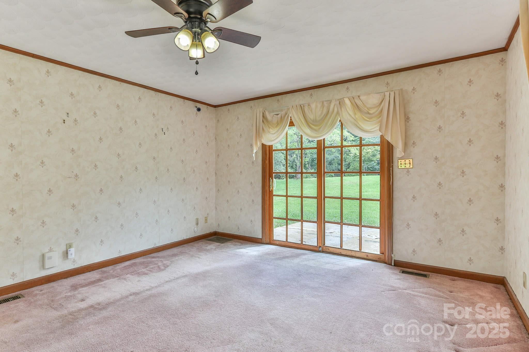 554 Wildlife Access Road Hickory, NC 28601 - Photo 11 of 34 wooden floor in an empty room with a window