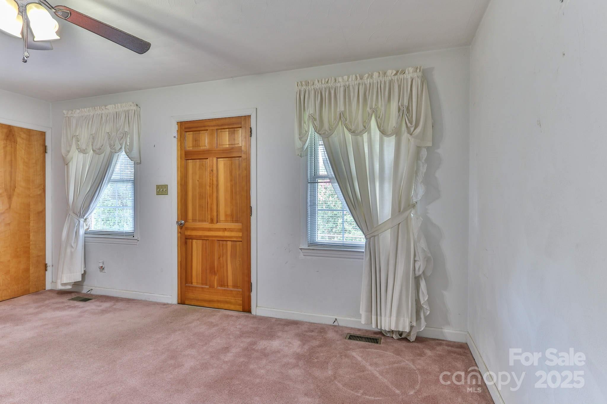554 Wildlife Access Road Hickory, NC 28601 - Photo 14 of 34 an empty room with windows