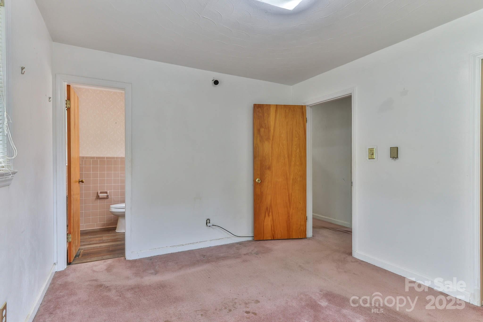 554 Wildlife Access Road Hickory, NC 28601 - Photo 16 of 34 wooden floor and closet in a room