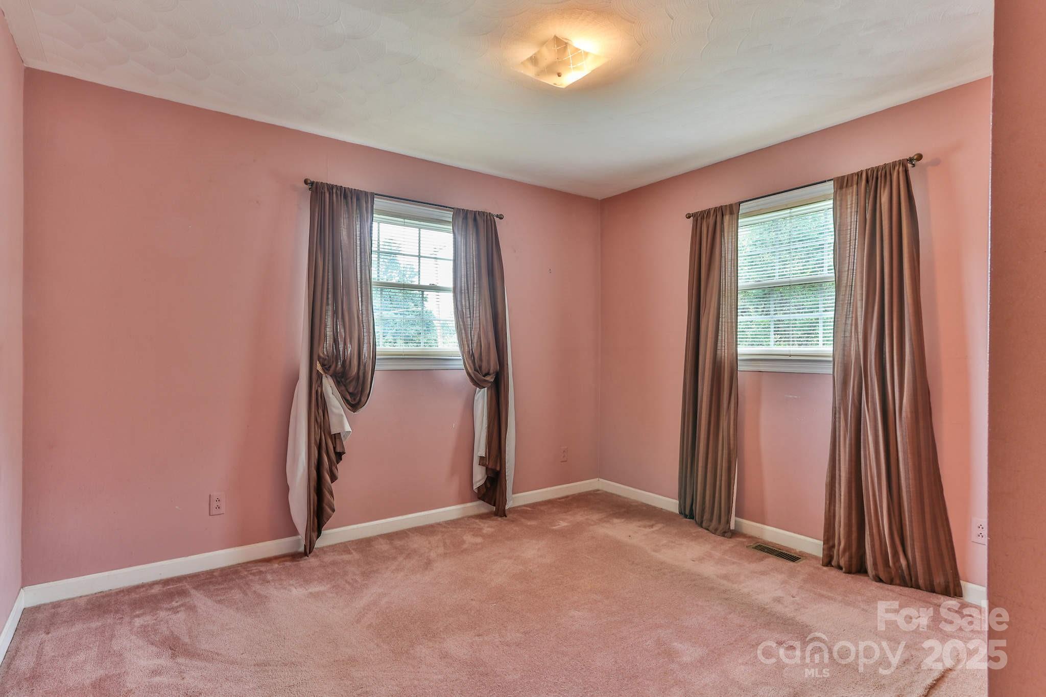 554 Wildlife Access Road Hickory, NC 28601 - Photo 19 of 34 an empty room with windows