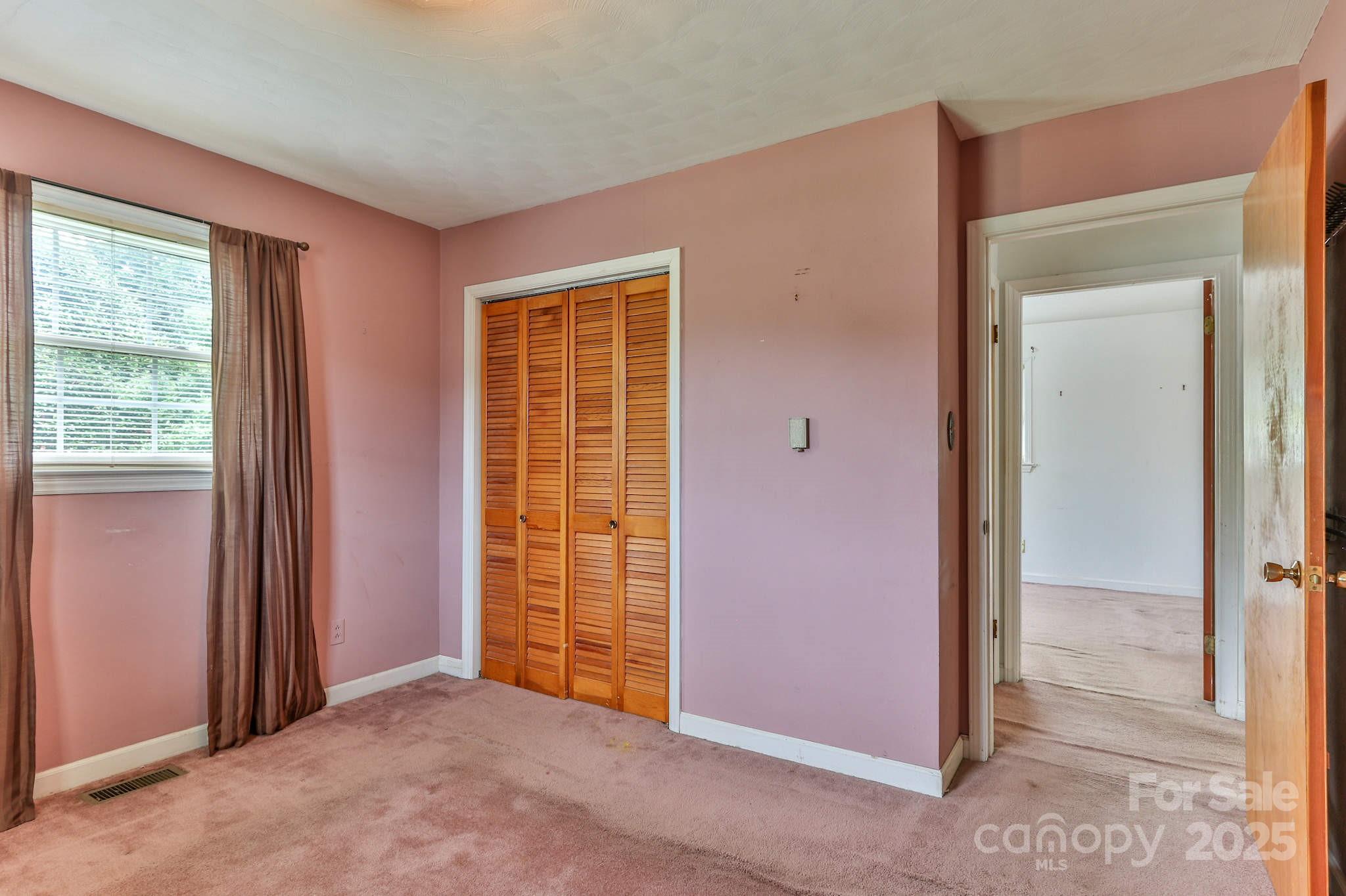 554 Wildlife Access Road Hickory, NC 28601 - Photo 21 of 34 an empty room with windows