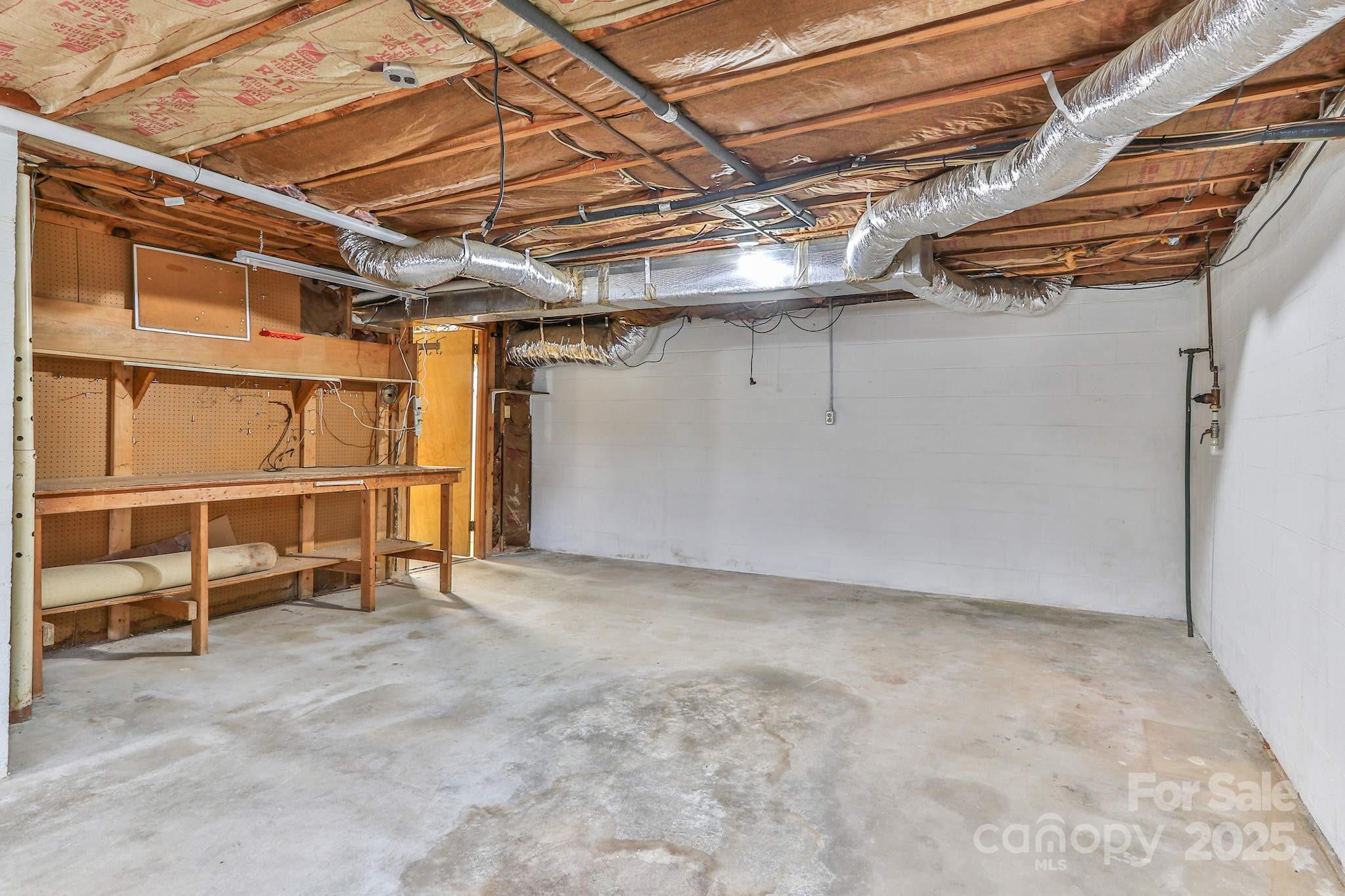 554 Wildlife Access Road Hickory, NC 28601 - Photo 32 of 34 a view of an empty room with a staircase