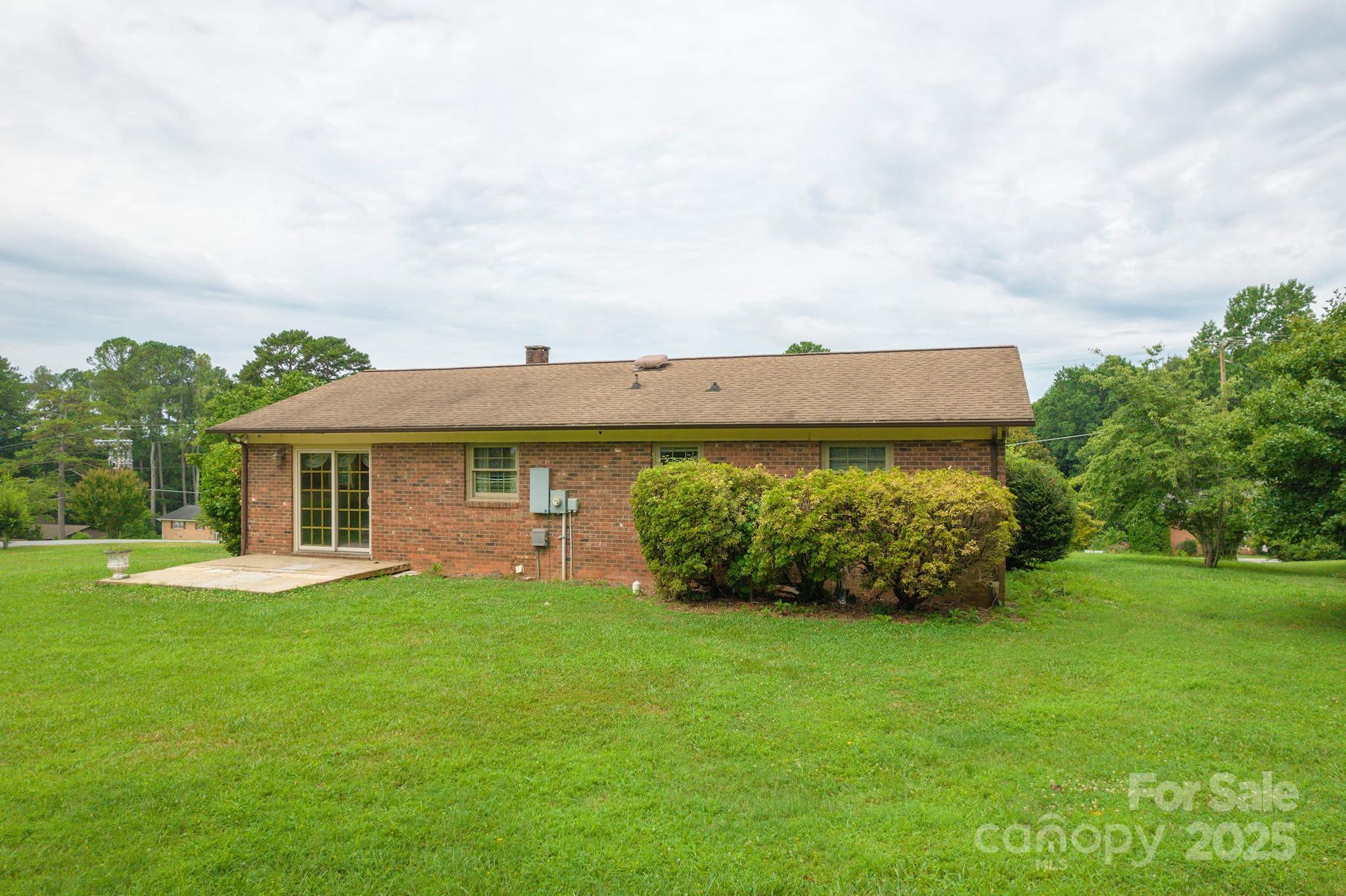 554 Wildlife Access Road Hickory, NC 28601 - Photo 34 of 34 a front view of a house with garden