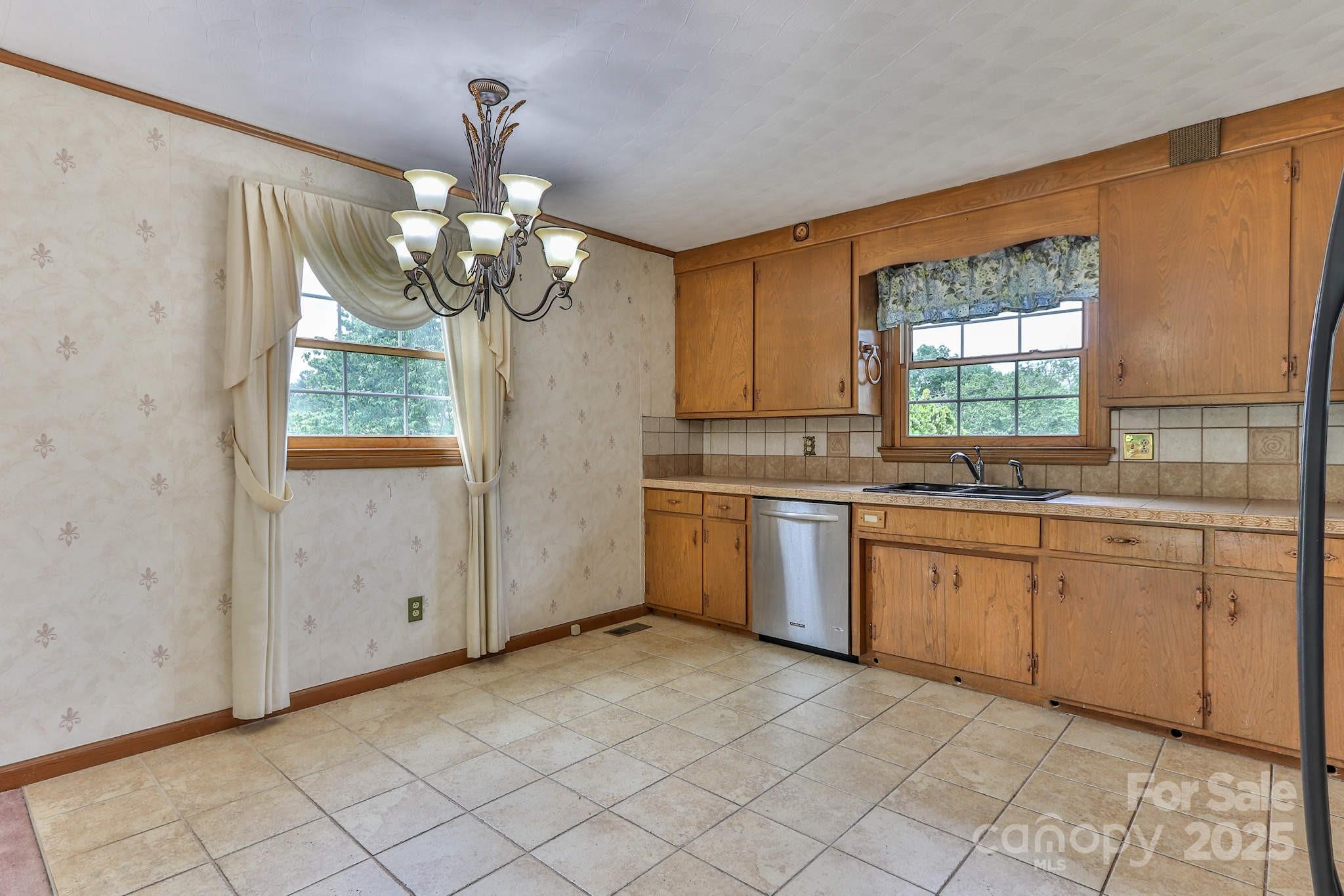 554 Wildlife Access Road Hickory, NC 28601 - Photo 8 of 34 a kitchen that has a sink and a stove top oven