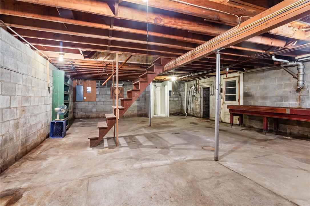 479 Cherry Hill Road Nazareth, PA 18064 - Photo 15 of 25 Exposed ceiling joists and concrete block walls frame this expansive basement space.