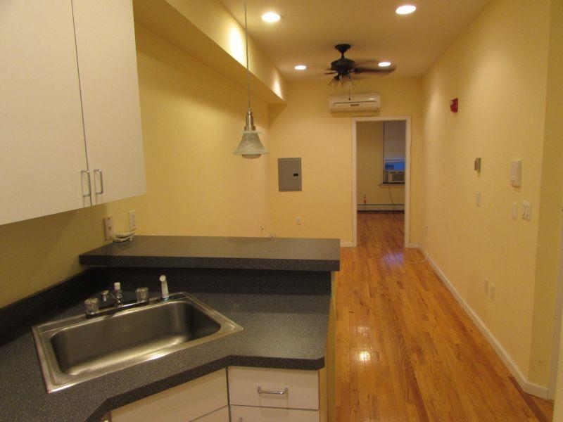 358 3rd Street, Unit 3R Hoboken, NJ 07030 - Photo 2 of 8 a bathroom with a sink and a shower