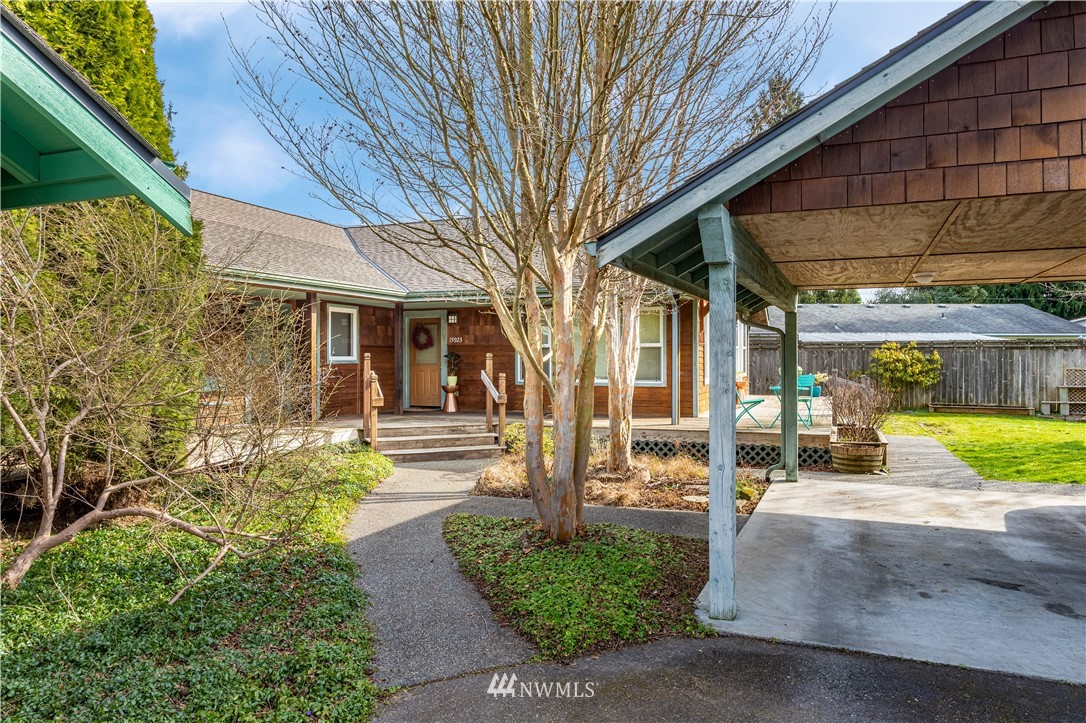 15921 179th Avenue Southeast Monroe, WA 98272 - Photo 2 of 27 a view of a building with a garden