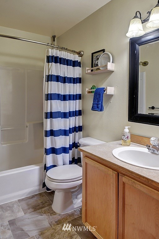 15921 179th Avenue Southeast Monroe, WA 98272 - Photo 11 of 27 a bathroom with a sink toilet and shower