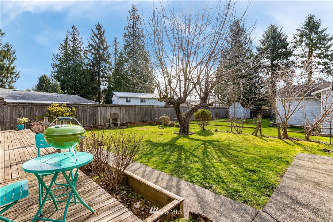 15921 179th Avenue Southeast Monroe, WA 98272 - Photo 22 of 27 a view of swimming pool with sitting area and garden