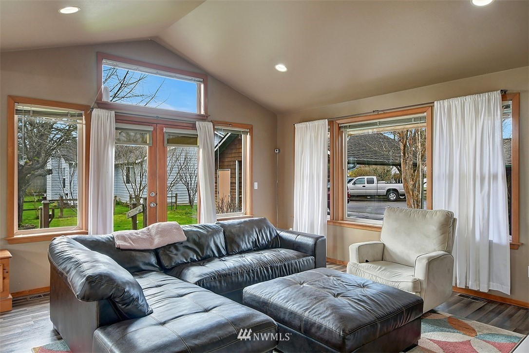 15921 179th Avenue Southeast Monroe, WA 98272 - Photo 5 of 27 a living room with furniture and a large window