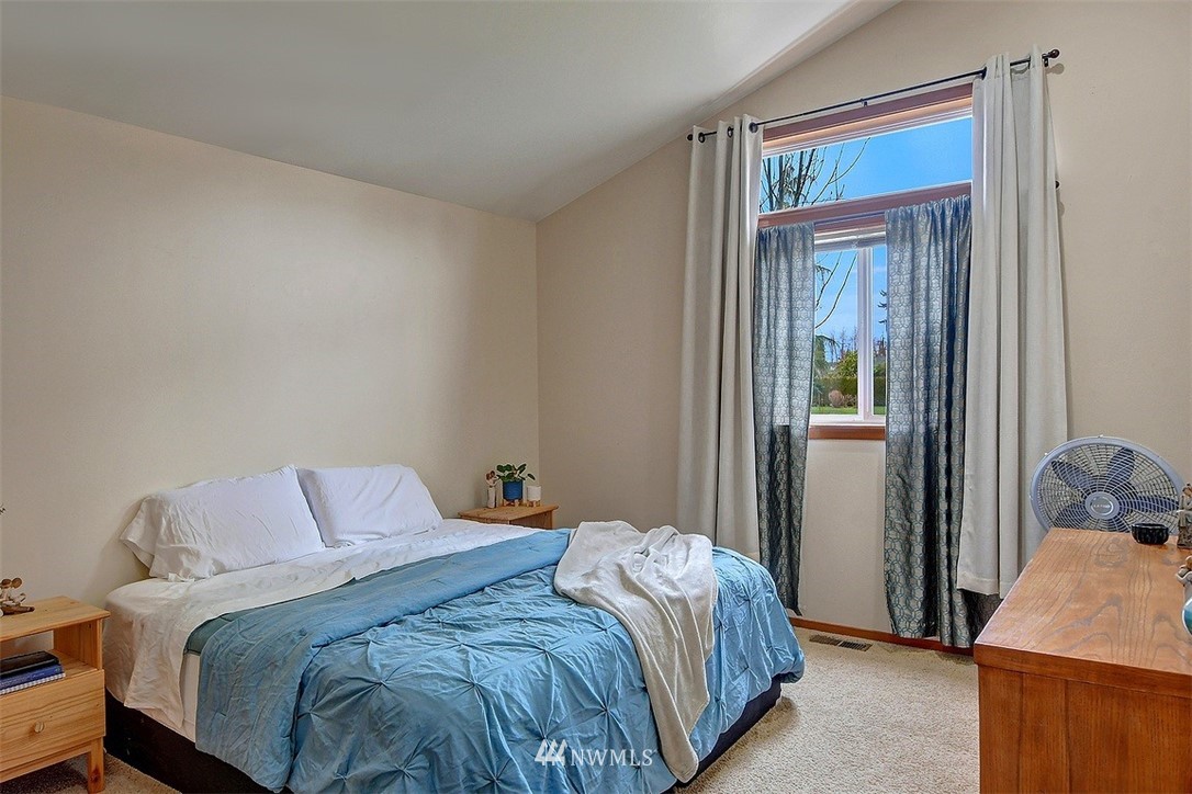 15921 179th Avenue Southeast Monroe, WA 98272 - Photo 8 of 27 a bedroom with a bed and a dresser