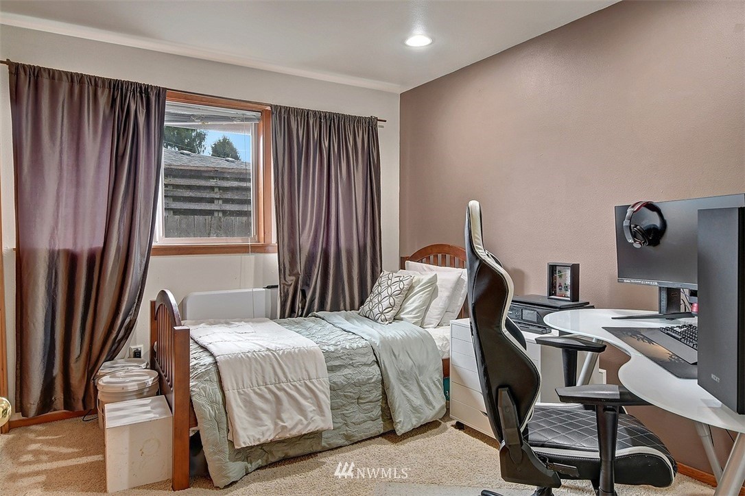 15921 179th Avenue Southeast Monroe, WA 98272 - Photo 10 of 27 a bedroom with a bed and a window