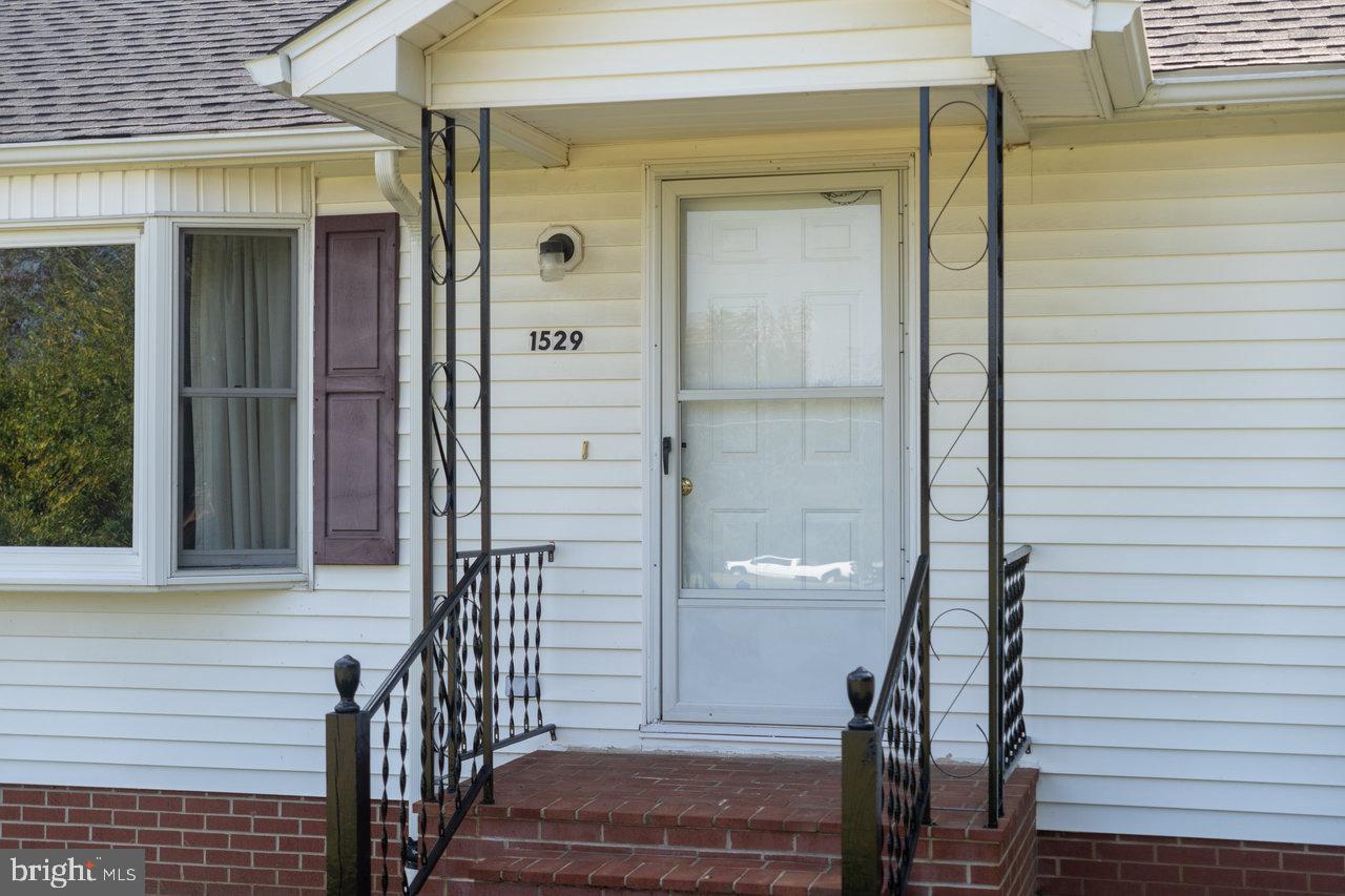 1529 Goodrich Road Stanley, VA 22851 - Photo 2 of 42 a view of front door and porch