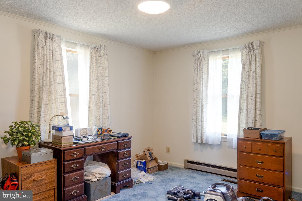 1529 Goodrich Road Stanley, VA 22851 - Photo 26 of 42 a living room with furniture and a window