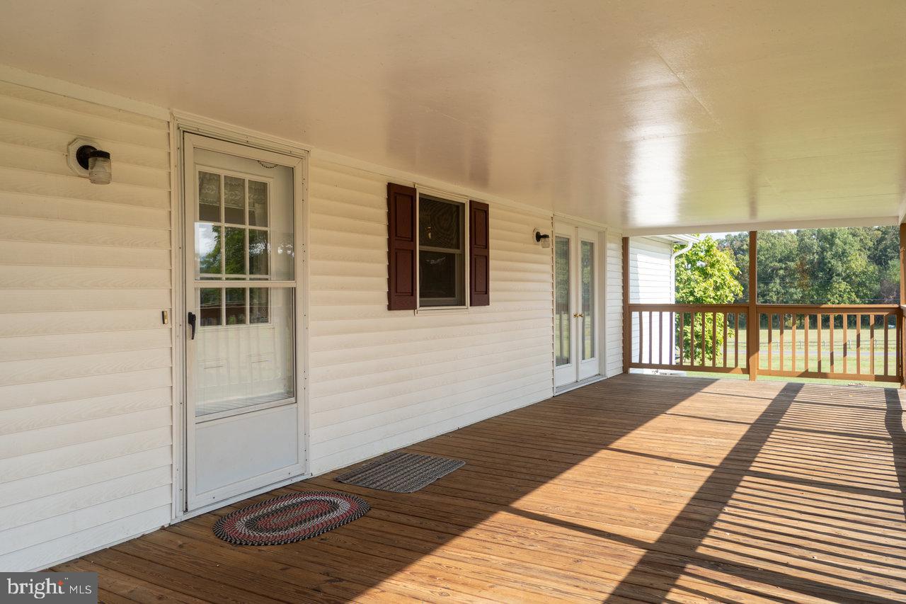 1529 Goodrich Road Stanley, VA 22851 - Photo 34 of 42 a view of a balcony with wooden floor