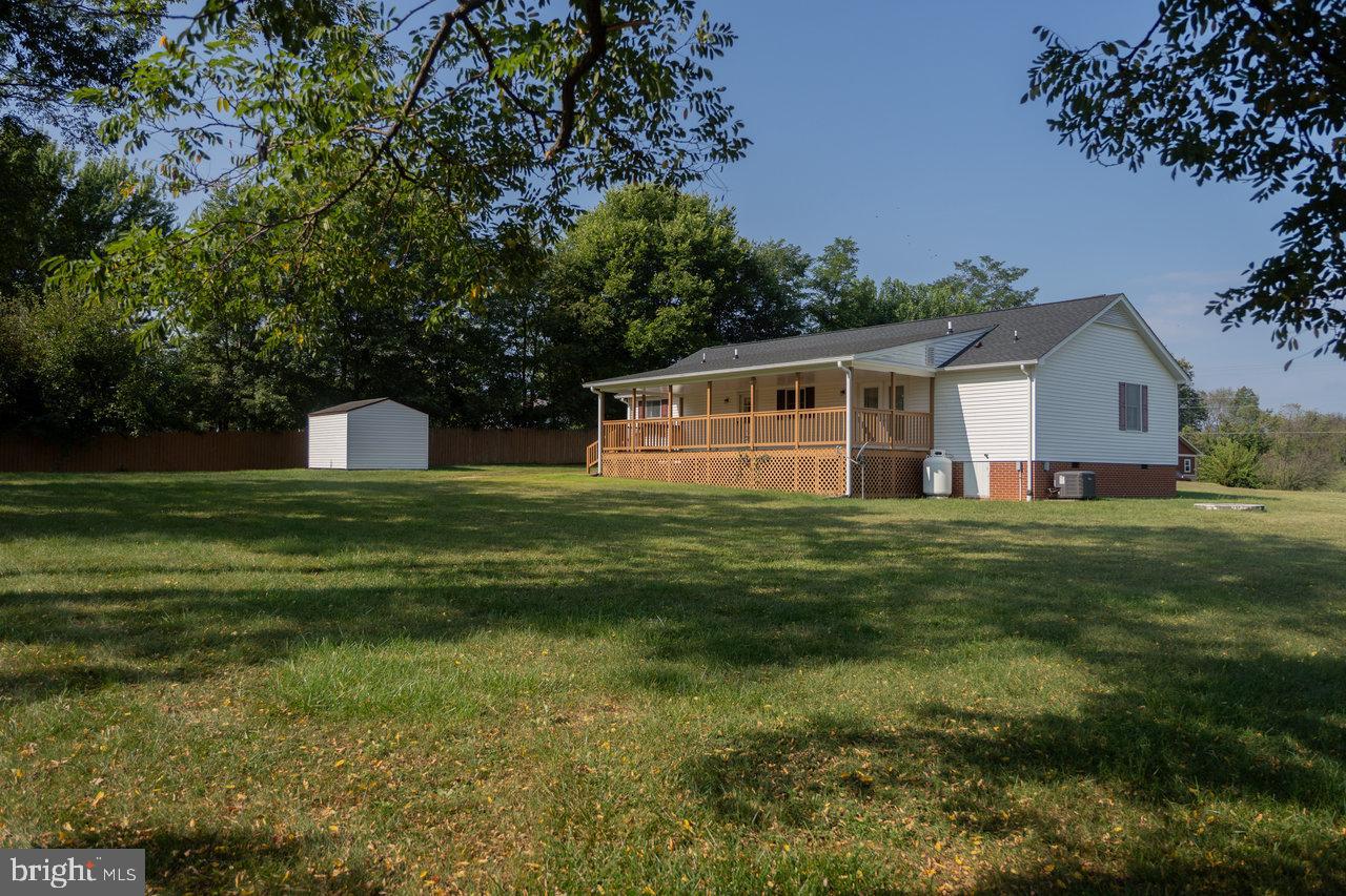 1529 Goodrich Road Stanley, VA 22851 - Photo 40 of 42 a front view of house with yard and green space