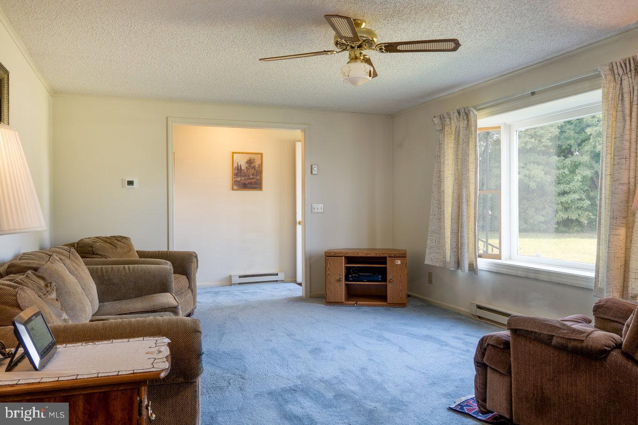 1529 Goodrich Road Stanley, VA 22851 - Photo 4 of 42 a living room with furniture and a window