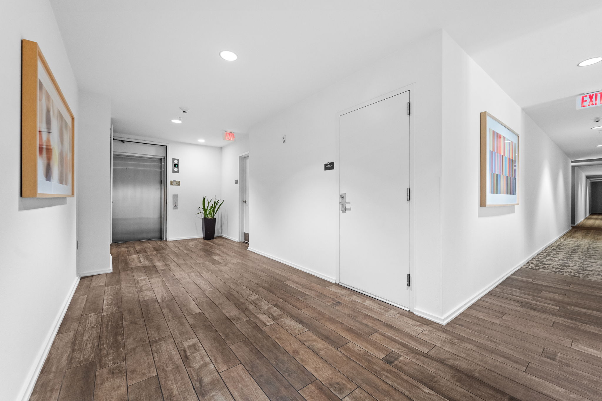 1600 Barton Springs Road, Unit 4602 Austin, TX 78704 - Photo 26 of 39 Hallway with wood finished floors, recessed lighting, and elevator
