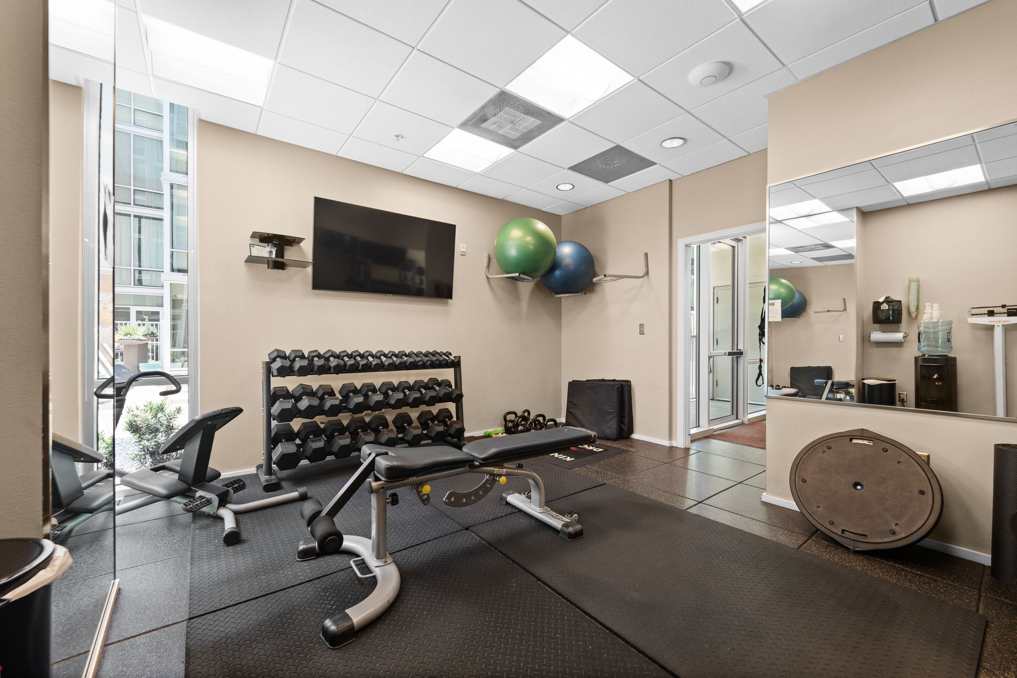 1600 Barton Springs Road, Unit 4602 Austin, TX 78704 - Photo 28 of 39 Workout area featuring a paneled ceiling