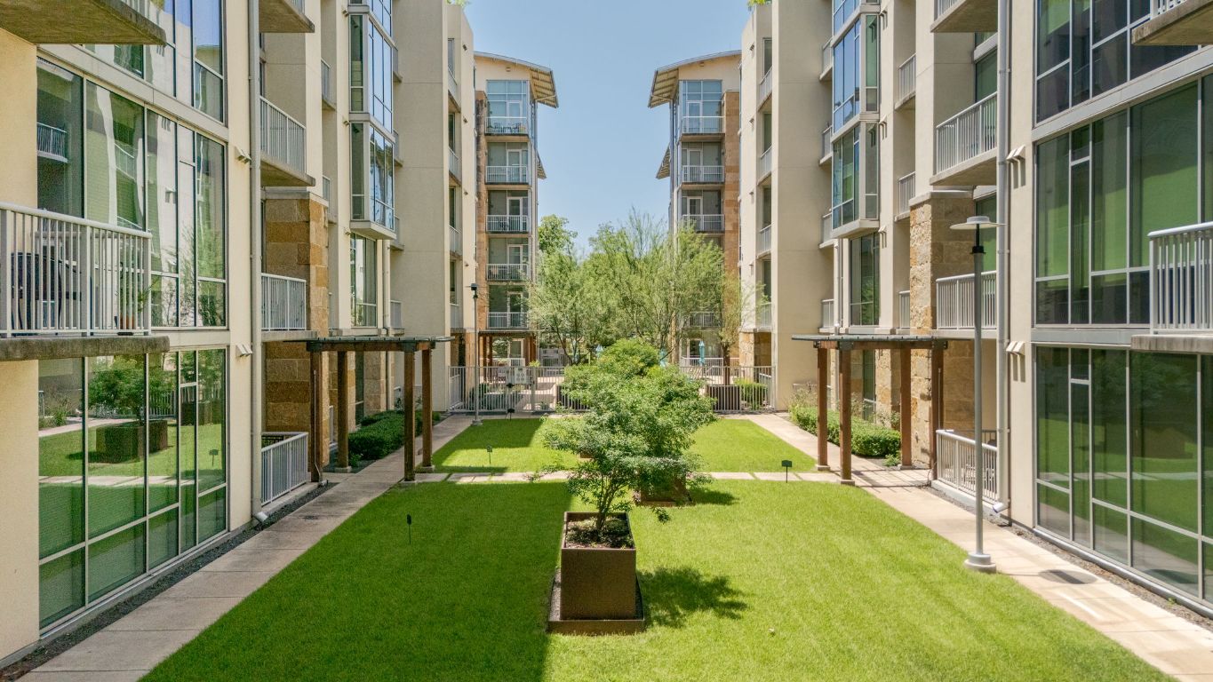 1600 Barton Springs Road, Unit 4602 Austin, TX 78704 - Photo 31 of 39 a view of building with yard